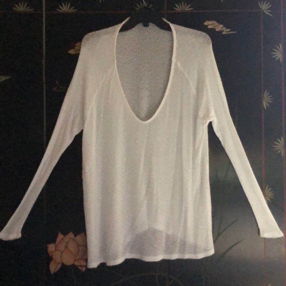 Long sleeve knit white top. Very light weight